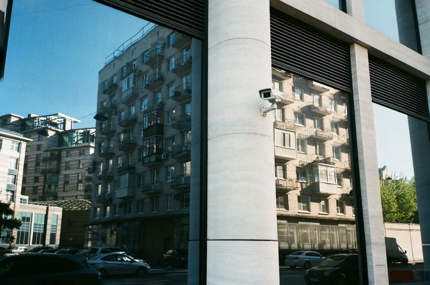 Security camera mounted on a column outside a residential building