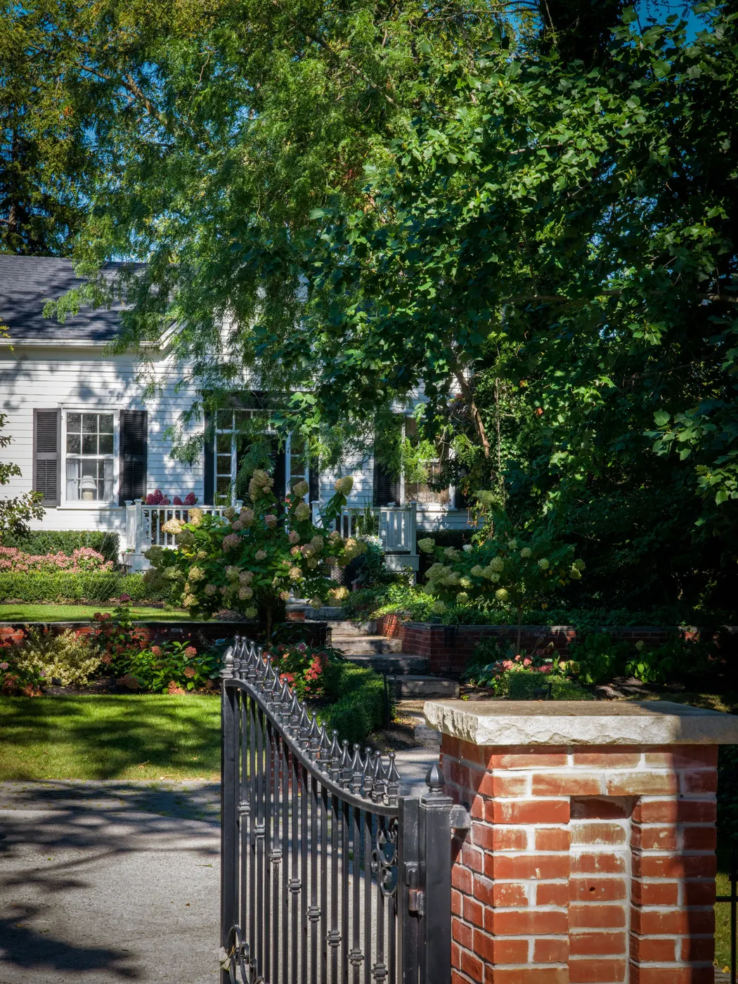 Wrought iron gate at the entrance of a suburban house