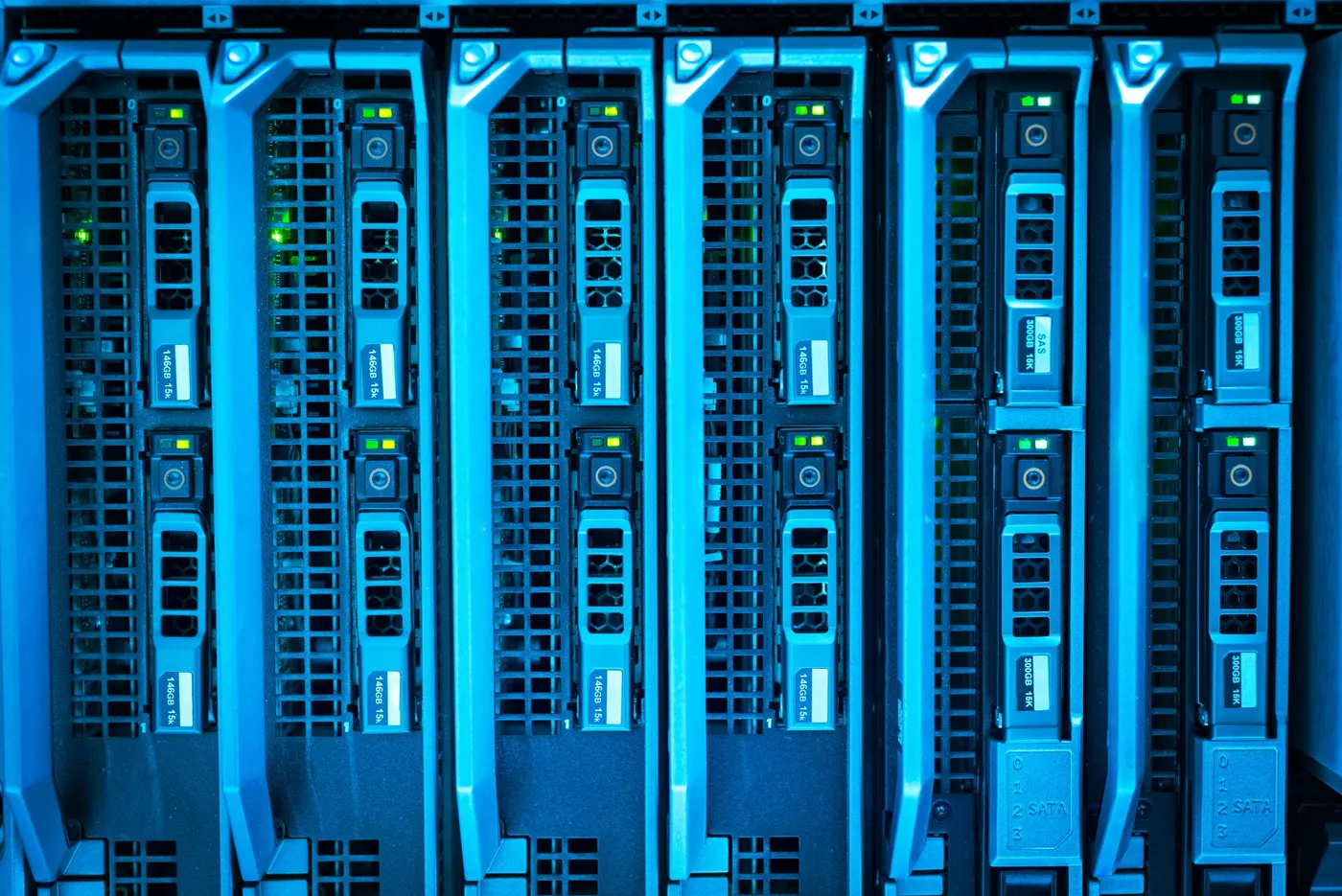 Row of rack servers illuminated in blue