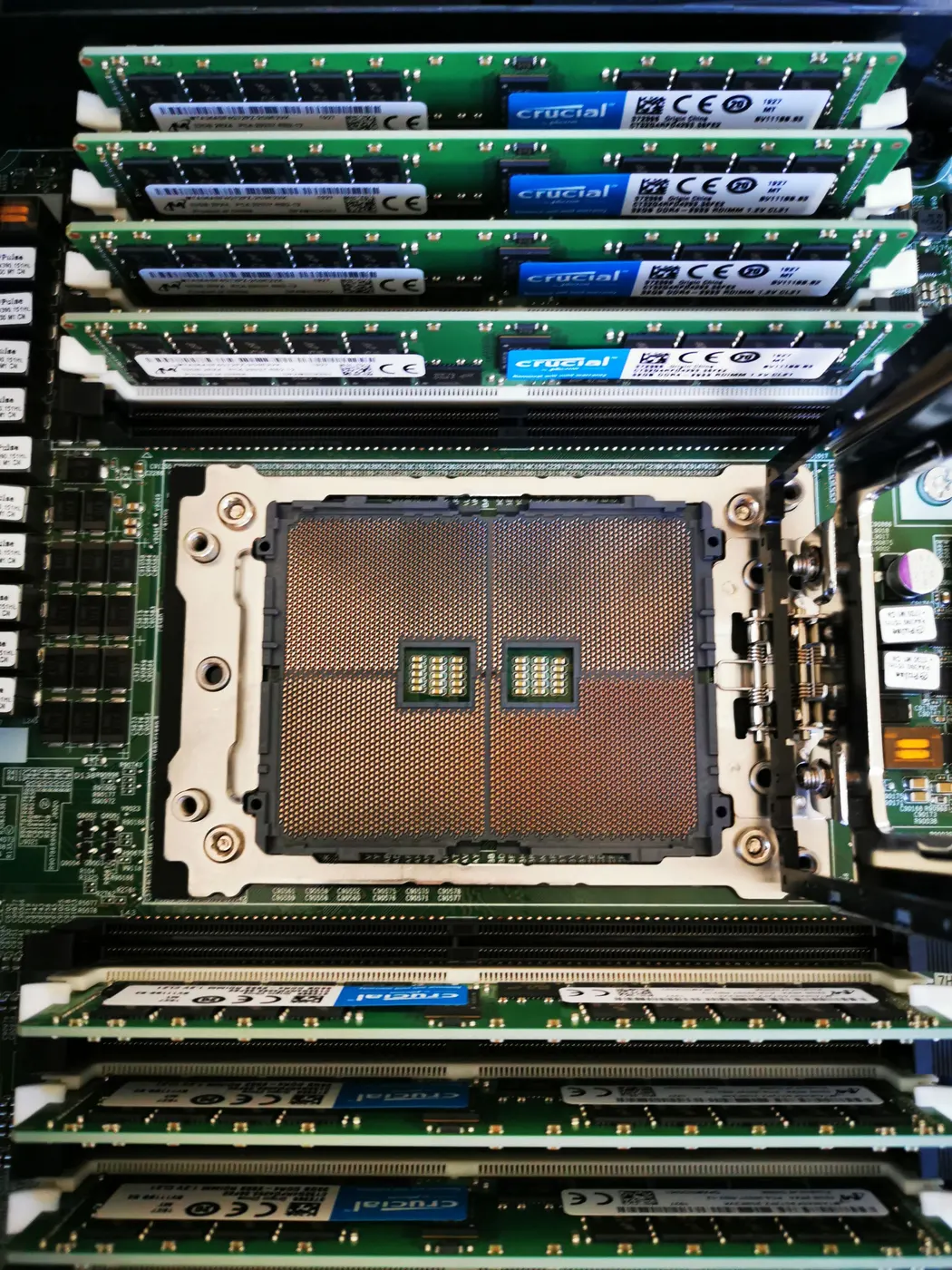 Server motherboard with CPU socket and rows of RAM modules